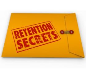 Retention Secrets word stamped in grunge red ink style on a yellow envelope to give you tips and advice on retaining customers or employees